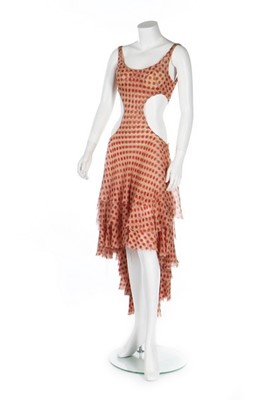 Lot 205 - An Alexander McQueen red polka-dot chiffon...