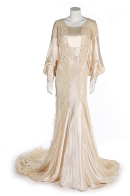 Lot 68 - A bias-cut satin bridal gown, 1930s, with full,...