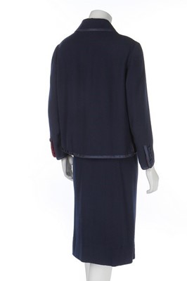 Lot 86 - A Chanel couture navy moss crpe suit,...