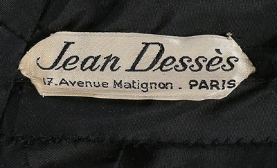 Lot 80 - A Jean Dessès couture black faille cocktail...