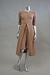 Lot 1 - A Mary Quant brown and white knitted maxi coat...