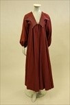 Lot 27 - A Zandra Rhodes purple felted wool circle coat,...