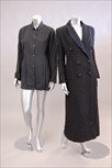 Lot 47 - A John Galliano black boucle wool full length...