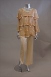 Lot 7 - A Granny Takes A Trip embroidered cream filet...