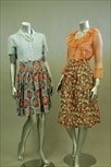 Lot 73 - A group of blouses and knitwear and skirts,...