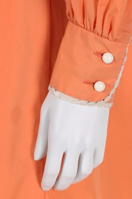 Lot 109 - A rare Twiggy boutique orange cotton dress,...