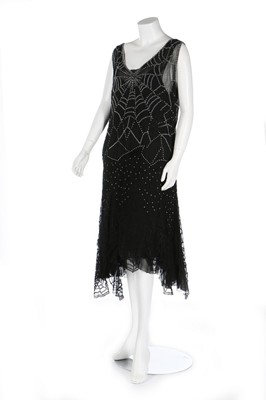 Lot 229 - A rare beaded chiffon 'Cobweb' flapper dress,...