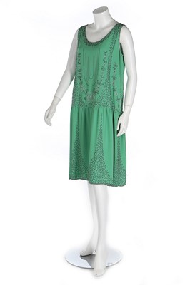 Lot 312 - A green satin-backed crepe flapper dress, late...