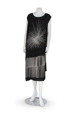 Lot 314 - A beaded black satin flapper dress, 1922-25,...