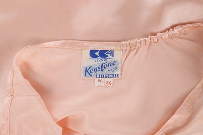Lot 58 - A large group of mainly peach satin French...