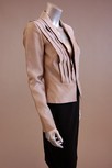 Lot 10 - A group of ivory and black formal separates, 5...
