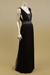 Lot 103 - A black silk tulle evening gown, V-neckline,...