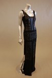 Lot 110 - A black satin evening gown, with bands of...