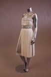 Lot 156 - A white silk tulle strapless cocktail dress,...