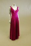 Lot 170 - A fuschia pink silk evening gown, low neckline...