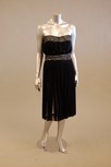 Lot 172 - A black silk tulle strapless cocktail dress,...