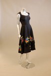 Lot 207 - A Fortnum and Mason black silk faille dress,...