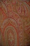 Lot 224 - A woven shawl of Paisley design, circa 1865,...