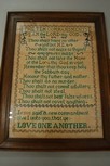 Lot 243 - Three cross-stitch samplers, early 20th...