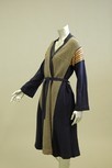 Lot 261 - An Alice Pollock long navy belted cardigan,...