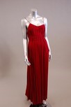 Lot 263 - A Quorum red draped jersey gown, 1970s,...