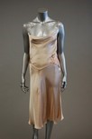 Lot 3 - Two summery cocktail dresses, one of ivory...