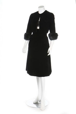 Lot 210 - A Pierre Balmain couture black velvet cocktail...