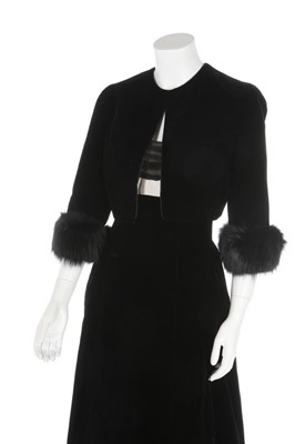 Lot 210 - A Pierre Balmain couture black velvet cocktail...