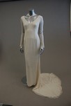 Lot 31 - A group of white evening and bridal wear,...