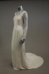 Lot 32 - A group of white evening and bridal wear,...