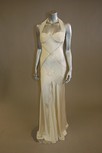 Lot 36 - Two ivory satin evening gowns, one with...
