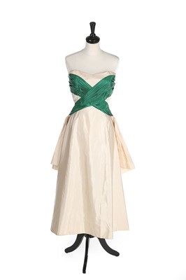 Lot 218 - A Maison Worth couture ivory taffeta gown,...