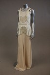 Lot 54 - A white sequined chiffon evening gown, the...