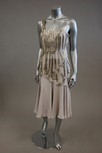 Lot 60 - A pale grey chiffon cocktail dress, the bodice...