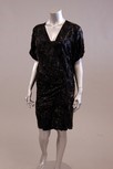 Lot 64 - A black chiffon wrap-over cocktail dress, with...