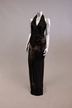 Lot 68 - A black and gold beaded evening ensemble,...