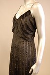 Lot 69 - A grey satin evening gown, with ribbons of...