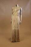 Lot 70 - A pale grey satin evening gown, with ribbons...