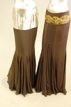 Lot 76 - Four evening skirts of brown satin and chiffon,...