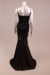 Lot 84 - A black georgette fish-tail evening gown, with...