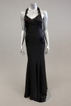 Lot 85 - A black satin and georgette evening gown, with...
