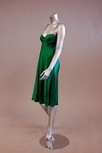 Lot 96 - Two emerald satin cocktail gowns, one with...
