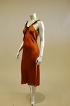 Lot 97 - Three cocktail dresses, comprising, bronze...