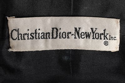 Lot 21 - A Christian Dior New York black silk-wool suit,...