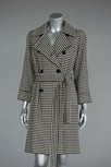 Lot 173 - An Yves Saint Laurent couture black and white...