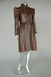 Lot 214 - An Yves Saint Laurent brown leather coat, late...