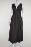 Lot 202 - A Madame Grs black draped jersey evening gown,...