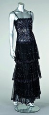 Lot 233 - A Lancetti couture jewelled black tulle...