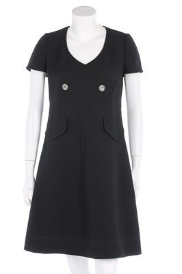 Lot 175 - A Courrèges black wool mix dress, circa 1970,...