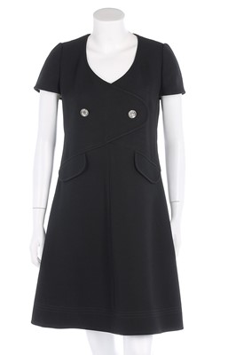 Lot 239 - A Courrèges black wool mix dress, circa 1970,...